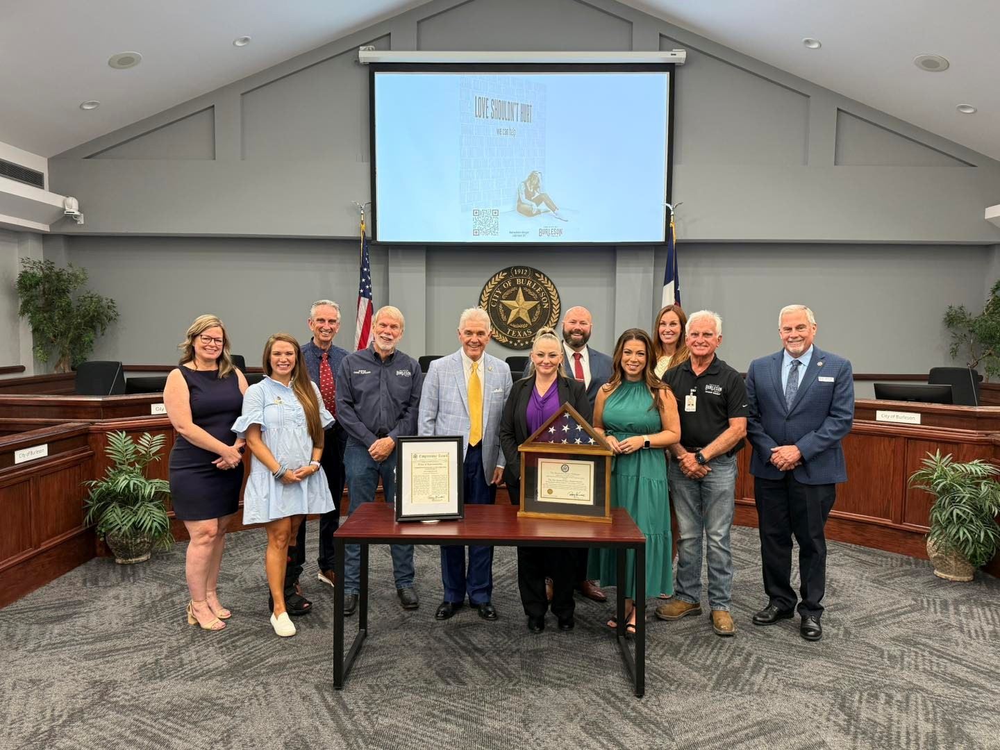 a photo of Congressman Roger Williams honoring Burleson Police and Councilmembers